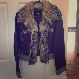 Leather jacket with fur collar